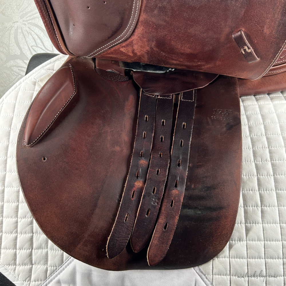 Image of used Intrepid Pro-Trainer Gold Deluxe jump saddle's near side billets.