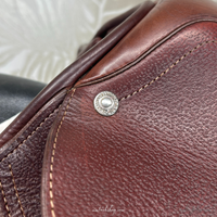 Image of used Intrepid Pro-Trainer Gold Deluxe jump saddle's near side headpin. 