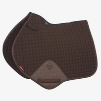 Image of the near side of Lemieux's brown cotton close contact square saddle pad on a white background